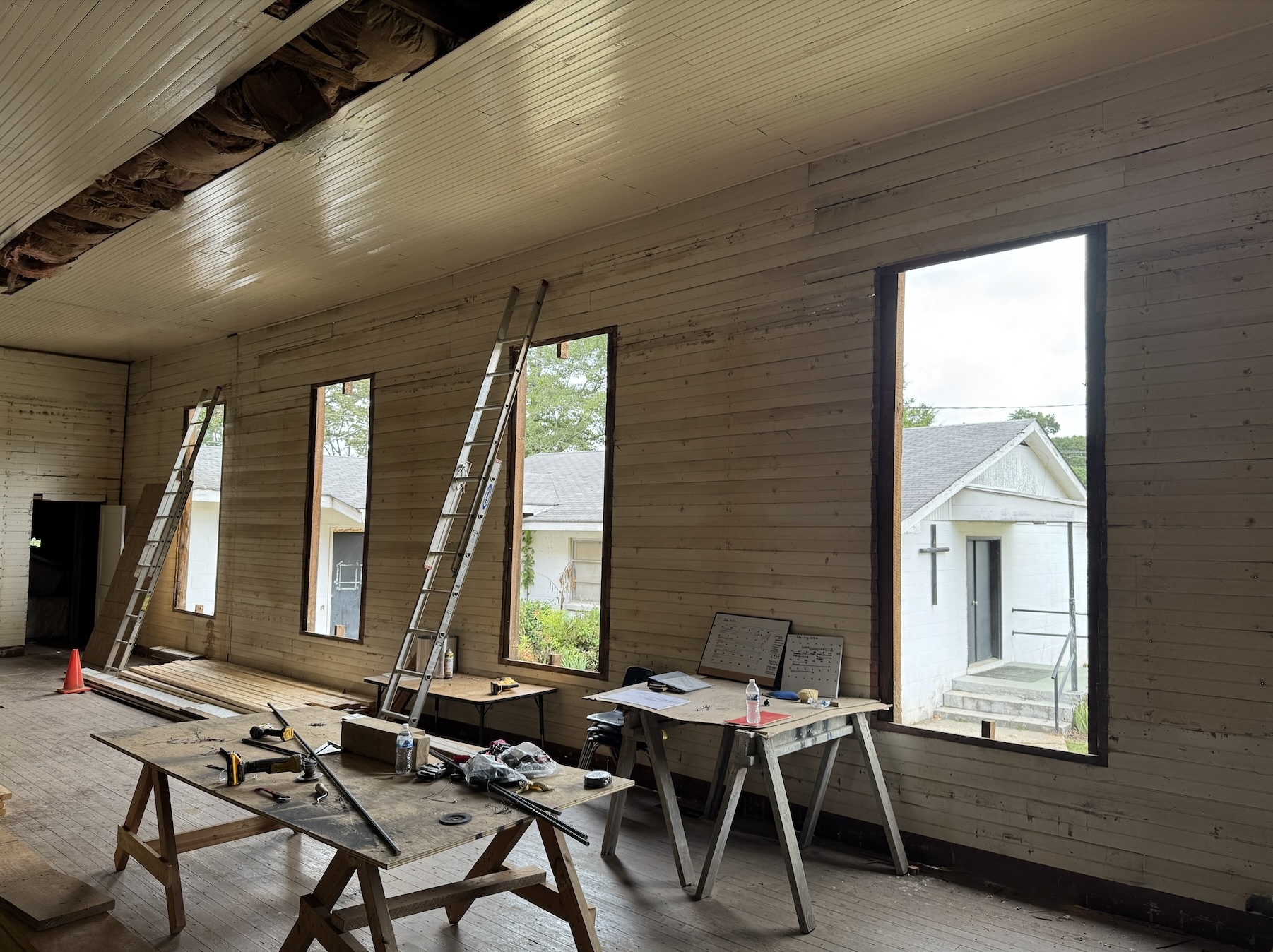 Restoration of Historic Woolsey Church interior with original window openings.