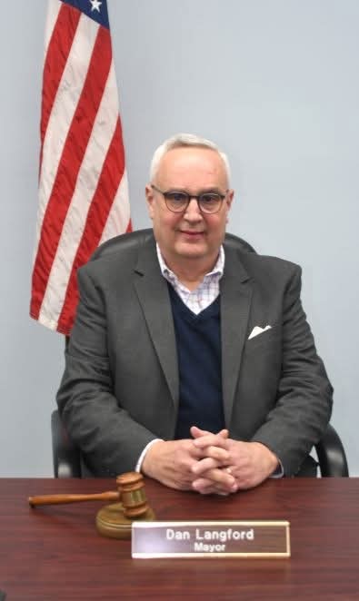 Portrait of Brooks Mayor and author Dan Langford