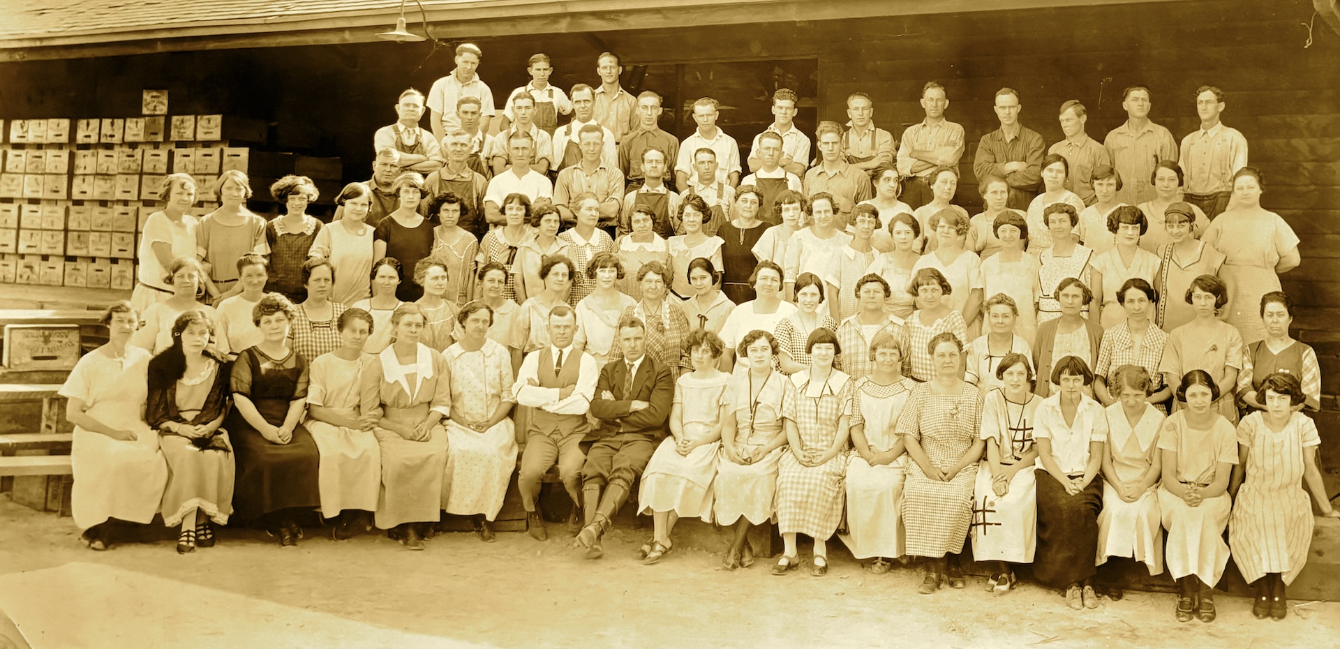 Group portrait of workers at the Woolsey peach packing plant.