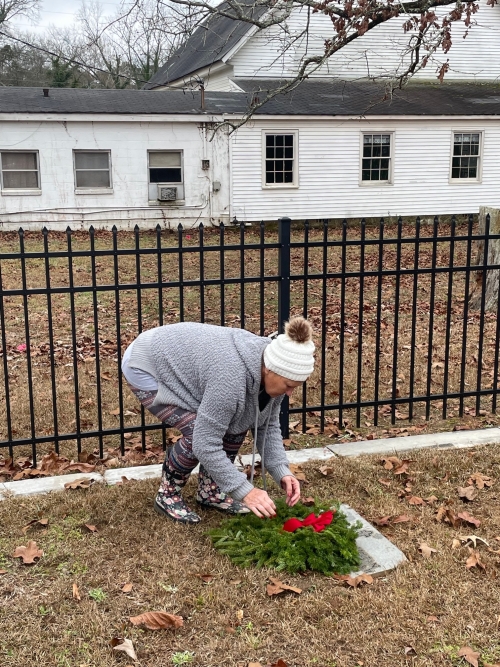 Gail Jenkins placing wreath on John Ballard McLean's grave Photo by David Jenkins © 2023