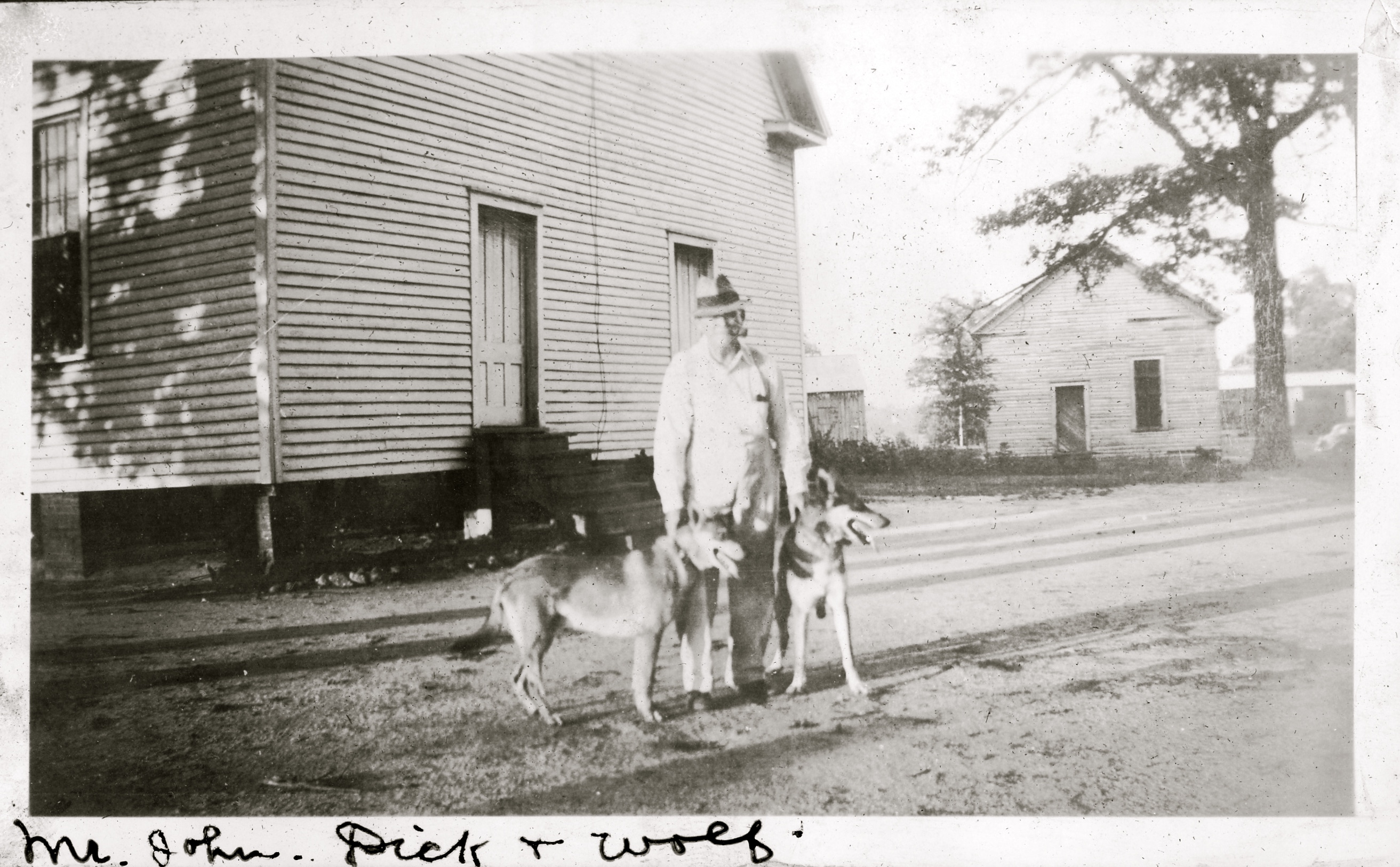 John McLean with his dogs Dick and Wolf. Courtesy of the Fayette County Historical Society John McLean with his dogs Dick and Wolf. Courtesy of the Fayette County Historical Society