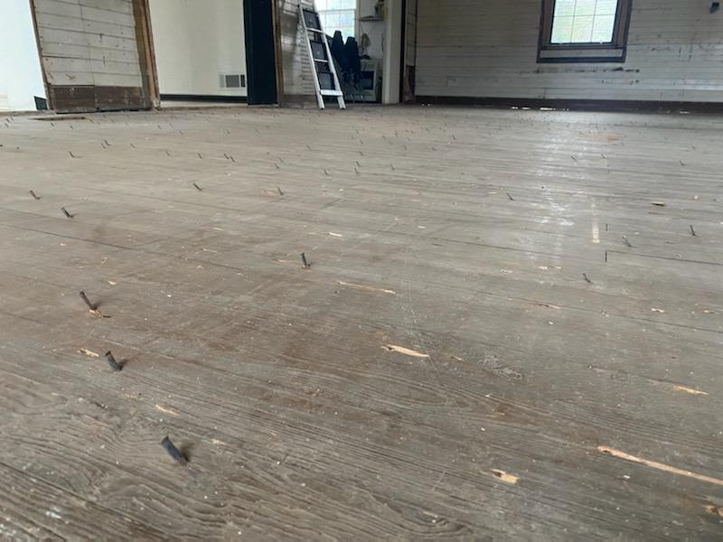 Removing the old nails Photo by Michael Bragg ©2025 Removing the old nails Photo by Michael Bragg ©2025