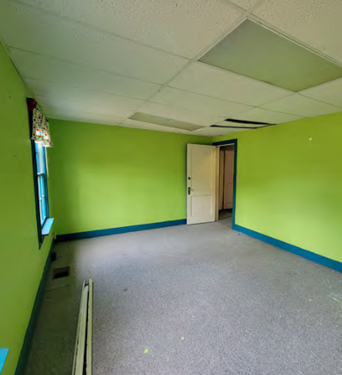 Green classroom before rehabilitation. Photo by Landmark Preservation Green classroom before rehabilitation. Photo by Landmark Preservation